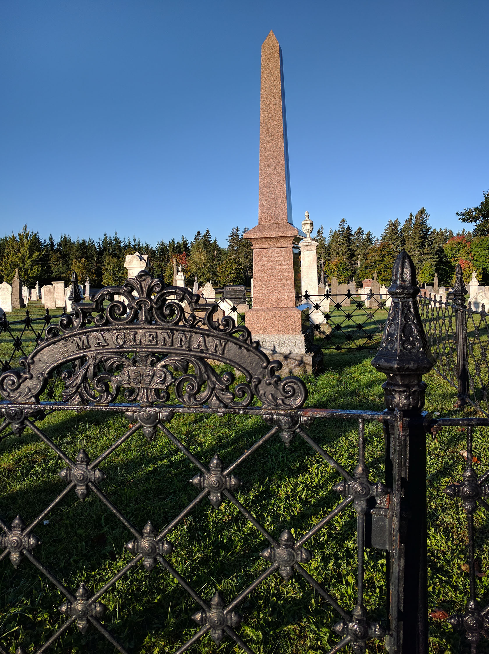 Photo of headstones/Rev John MacLennan memorial w gate Belfast PEI